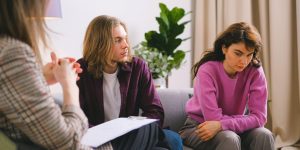 A couple having an counseling to a woman
