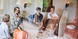 People sitting in circle during group therapy